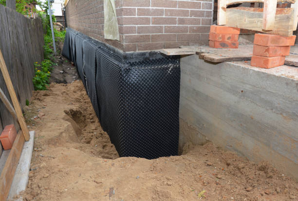Happy homeowners after waterproofing job in Delphi
